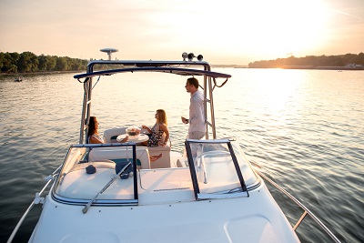 boat on the water with friends aboard